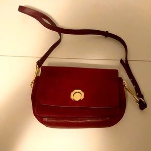 Louise et cie red leather bag never used! Light scuffing outer closure in move.